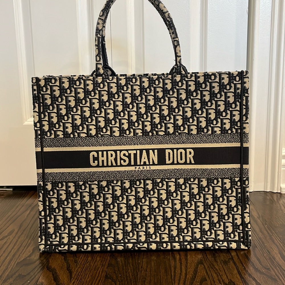 Christian Dior Authentic book tote in navy/tan logo print